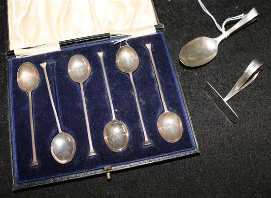 Silver coffee spoons, a pusher and a feeder